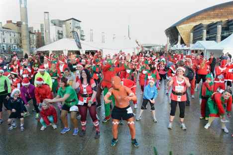 Christmas characters limbering up for the start of the 2013 event