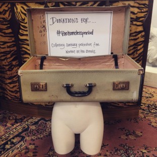 Linzie Elliot, owner of Eagle Eye Vintage in Cardiff, has placed a vintage suitcase in her shop to encourage donations of sanitary products for homeless women. (Photograph by Linzie Elliot)