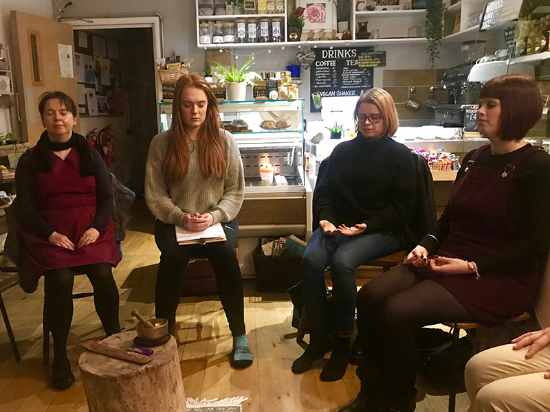 Siwan delivering a meditation class in Welsh