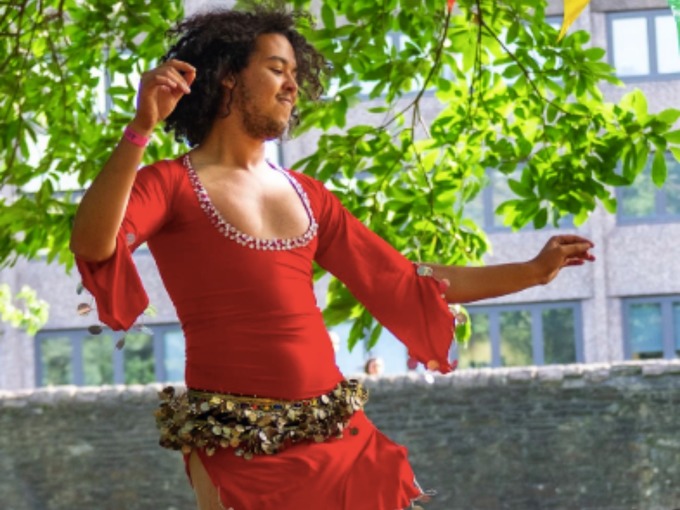 Abderrahim El Habachi in red dancing dress