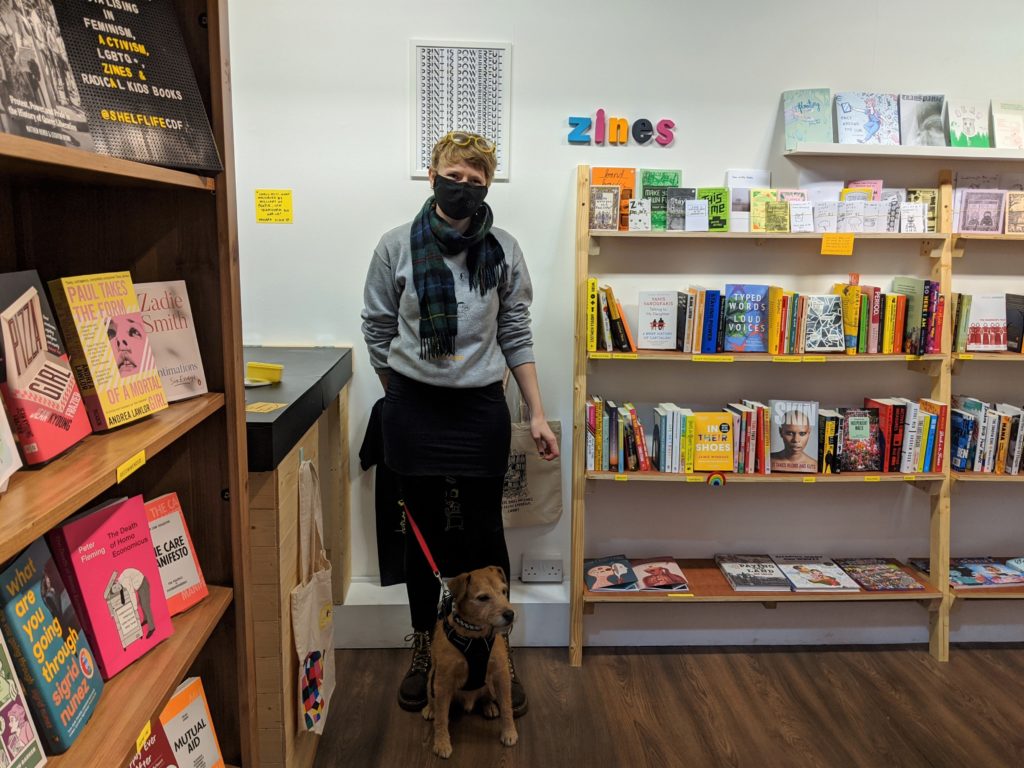 bookshop with owner and dog