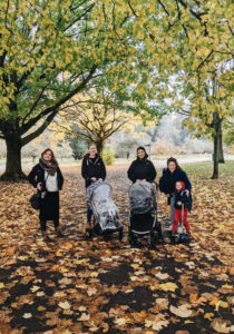 Group of women and children in an autumnal park