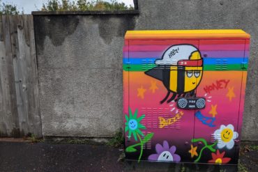 colourful graffiti on run down street