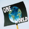 one world protest sign