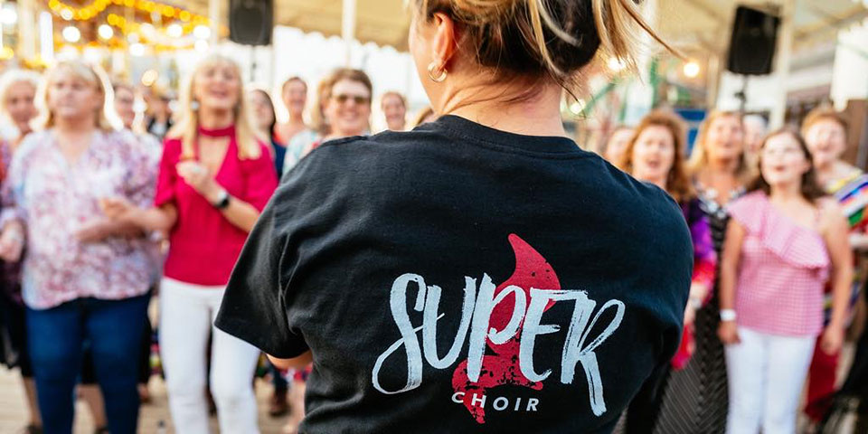 girl in super choir t shirt