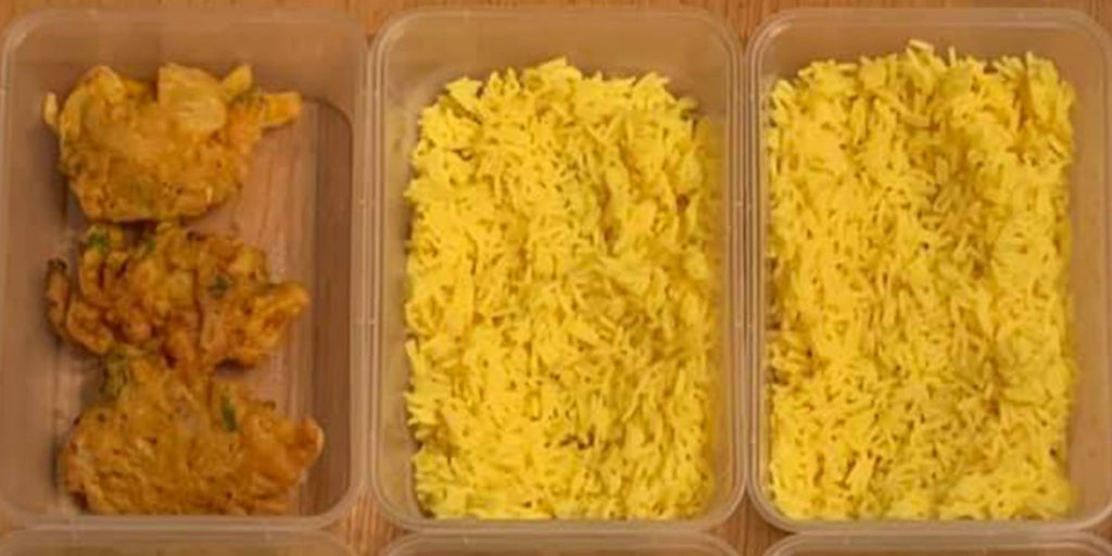 Tupperware boxes containing takeaway curry to raise money for Cardiff Foodbank