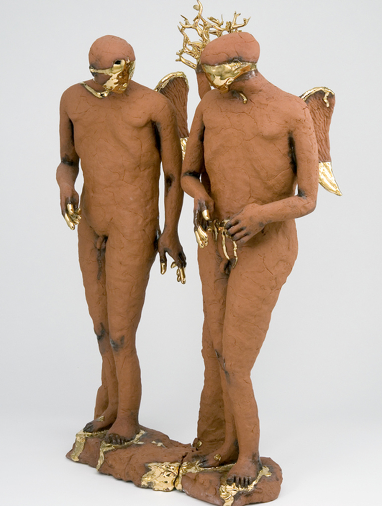 Clay sculpture of two angels