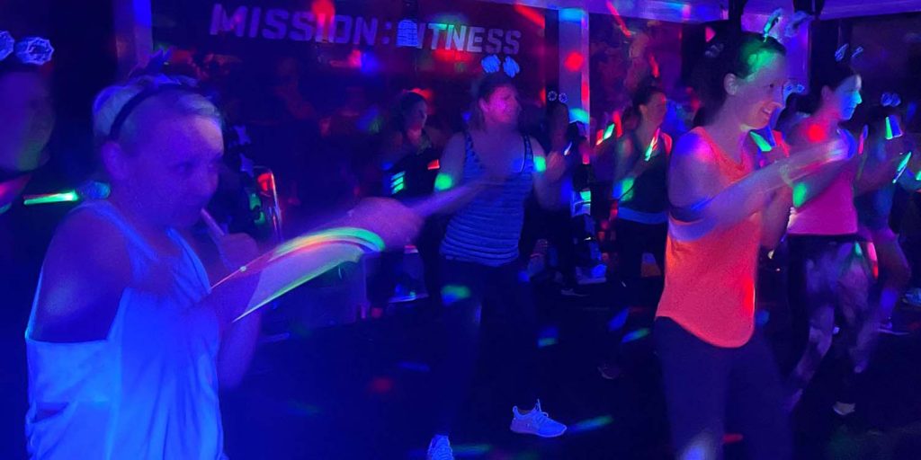 A class enjoying the Clubbercise indoor activity