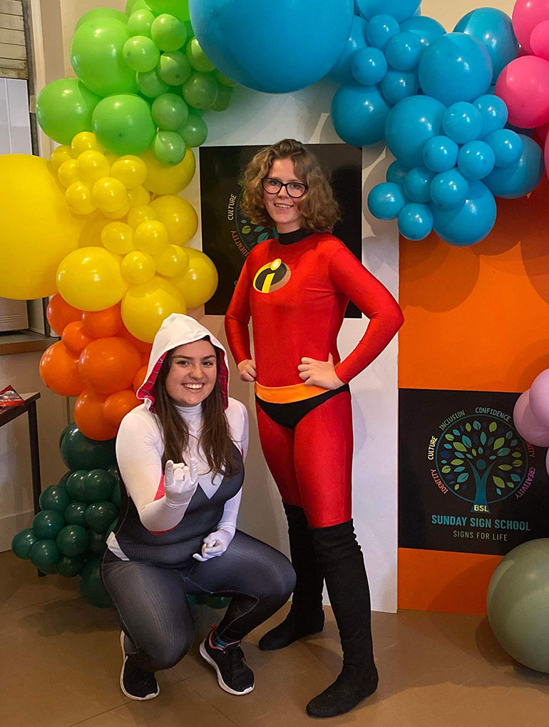 Victoria (left) and Seren Leale (vice president of Make a Smile Cardiff) dressed as Spider Gwen and Mrs Incredibles at a recent event. (Credit: Victoria Abrahams)