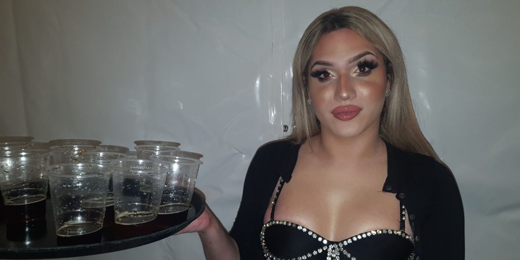 Nicolle Mozfi holding a tray of Jager bombs in Kings nightclubs