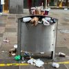 Rubbish oozing out of a bin across St David's at 3pm