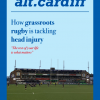 Magazine cover showing a rugby pitch