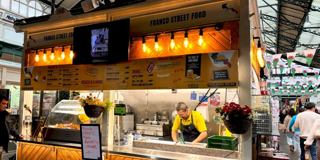 Franco kneads his sourdough in his street food stall.
 