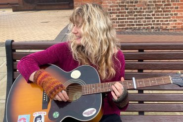 Verity Green plays guitar and talks about upcoming music