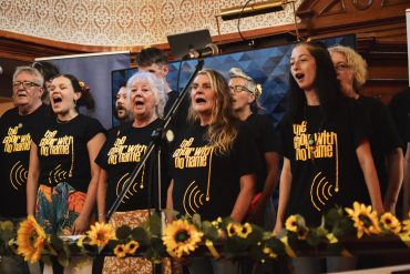 Homeless choir singing at concert.