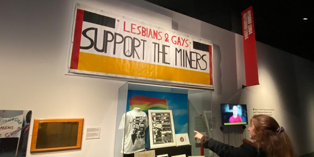 Inside the National Museum Cardiff exhibit about the 1984 miners' strikes, with banners on the walls