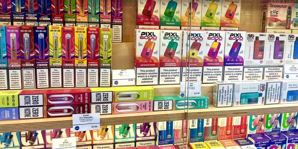 A selection of vapes in a shop window.