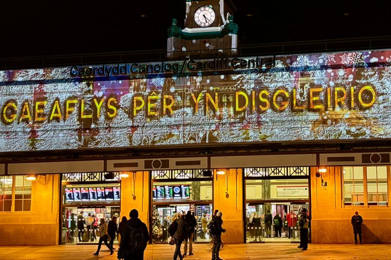 Outside of Cardiff Central train station, showing the Christmas illuminations