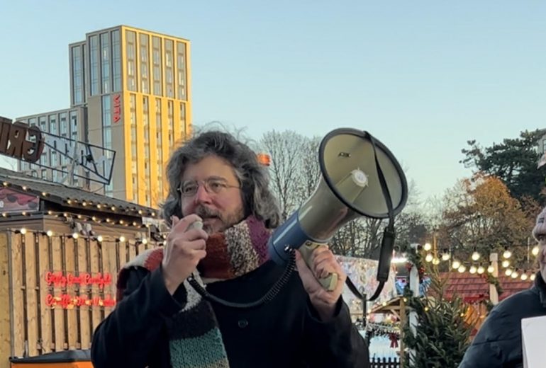 Adam Johannes Protesting with Cardiff People's Assembly