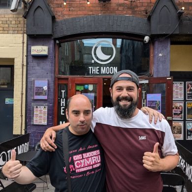 Richie and Mark standing outside The Moon with thumbs up