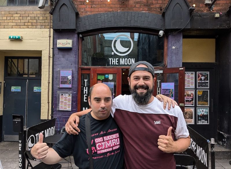 Richie and Mark standing outside The Moon with thumbs up