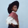 A Black school child in Traditional St David's day dress