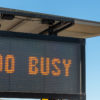A big sign saying 'too busy' to appeal to people who struggle with goal setting