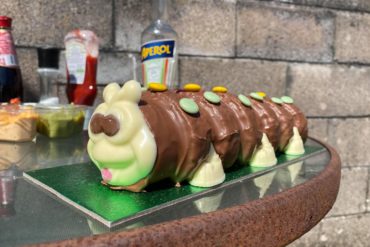 colin the caterpillar on a table outdoors