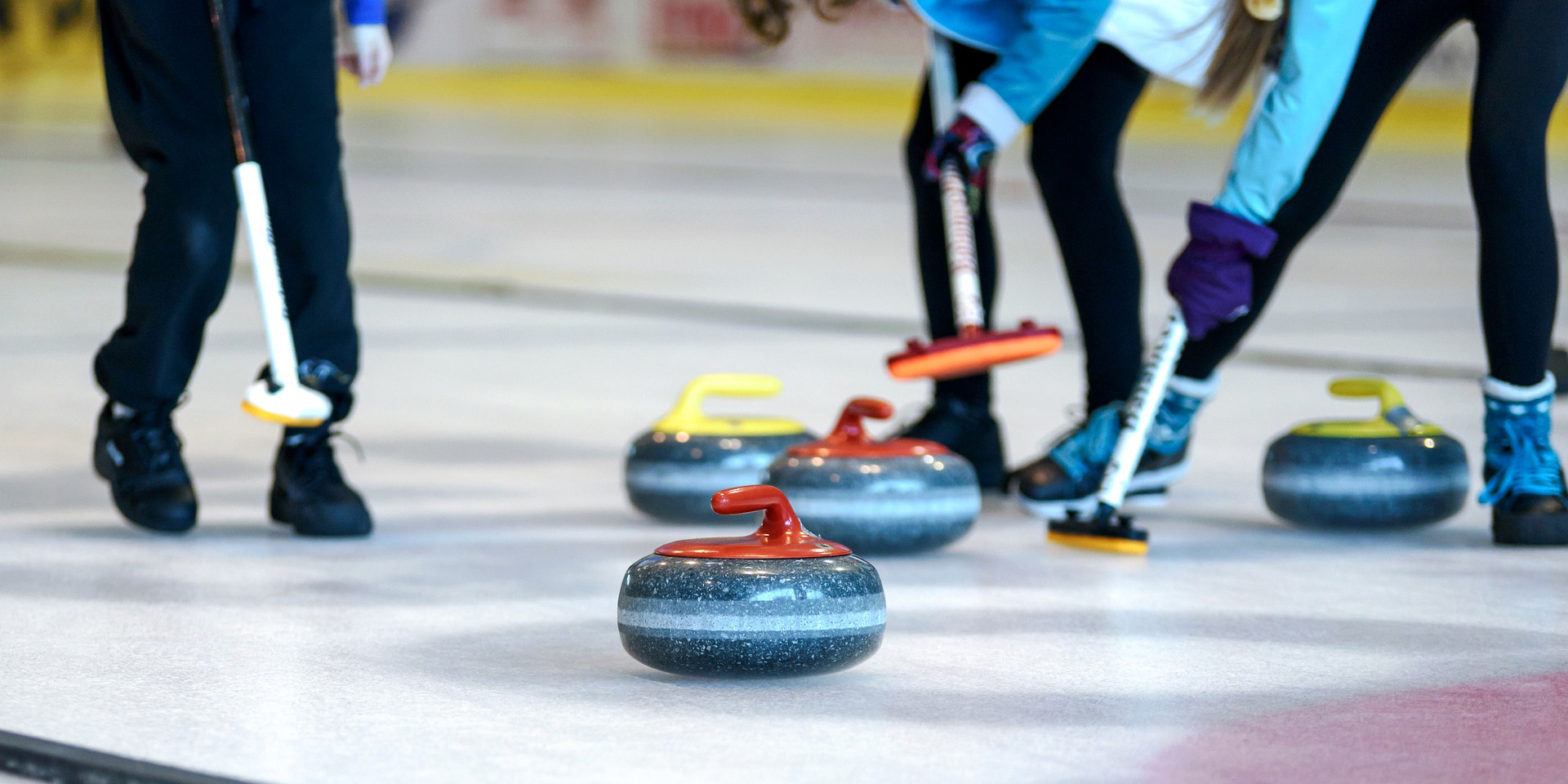Curlers on curling rink