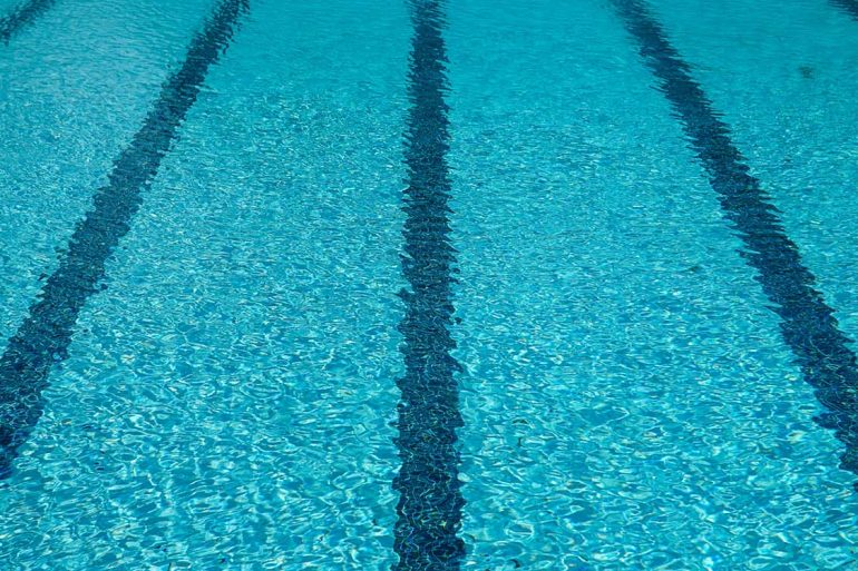 swimming pool divided into lanes