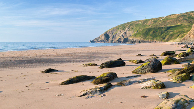 Penbryn beach in Ceredigion, James Bond's Die Another Day (2002) movie setting © www.visitwales.com
