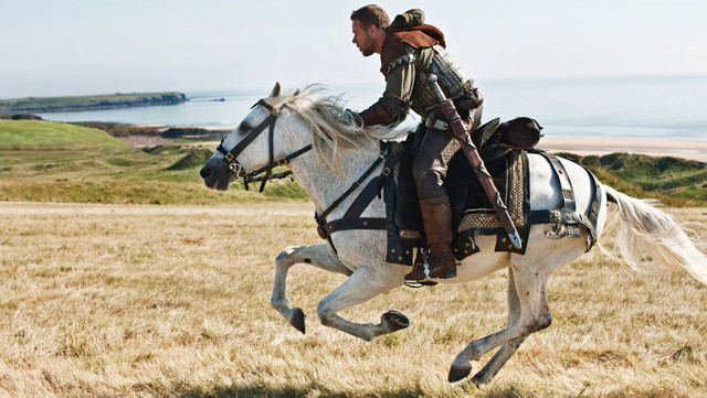 Russell Crowe is captured riding along the beautiful Freshwater West shore Russell Crowe is captured riding along the Freshwater West shore © 