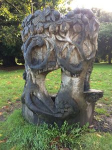 Sculptures such as this one were contributed by various artists, often using the wood from dead trees in the park