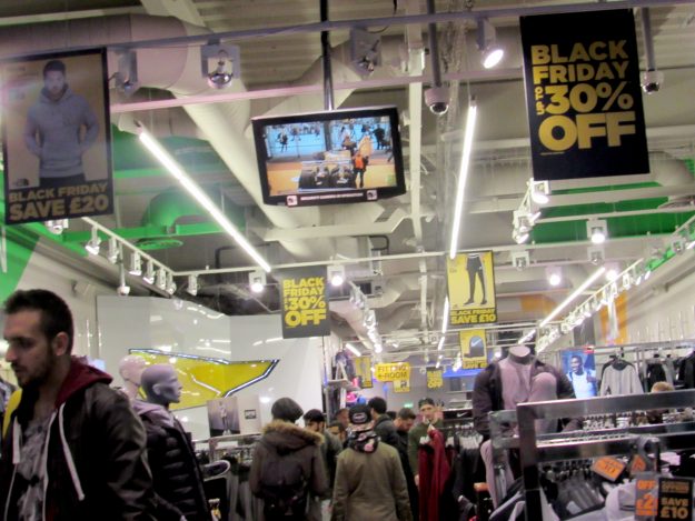 Shoppers check out stock in a Black Friday participating store on Queen Street, Cardiff recently.