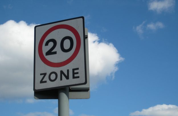 20mph zone sign on road side