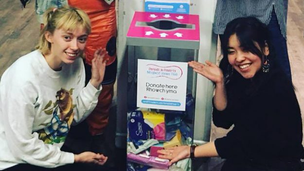 Members of Periods in Poverty at the Cathays campus menstrual product donation point. 