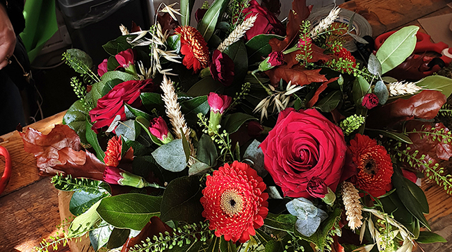 Bouquet of roses and a variety of flowers. 