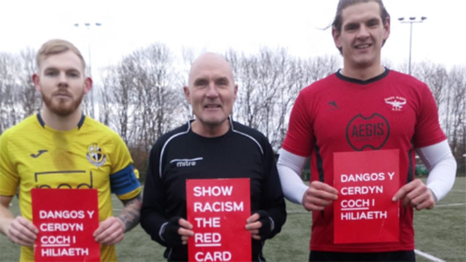This image has an empty alt attribute; its file name is Cathays-showing-racism-the-red-card.jpg