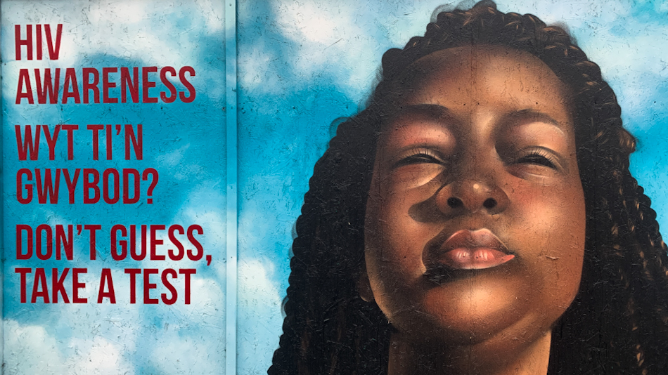 HIV AIDS Black woman mural street art Cardiff