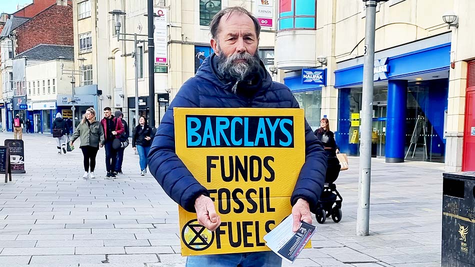 Man holding placard