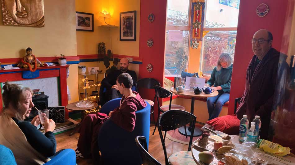 Devotees enjoying tea at the cafe