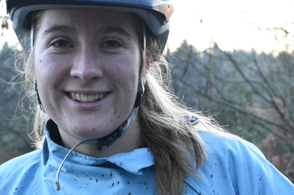 Laura smiling after a day of riding at the Forest of Dean