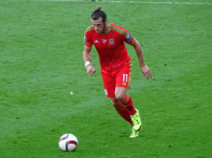 Gareth Bale lines up a shot during Wales last game
