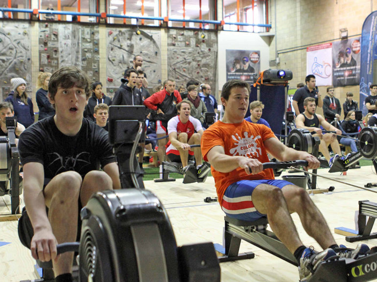 Rowers compete against the clock in the Welsh Indoor Rowing Championships.