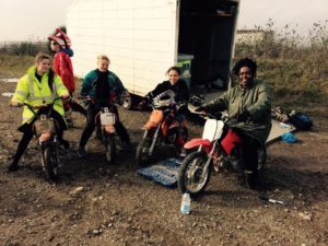 Members of BikeTrackElyWoods learning how to use off-road bikes safely