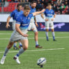 Owen Farrell kicks at goal for Saracens