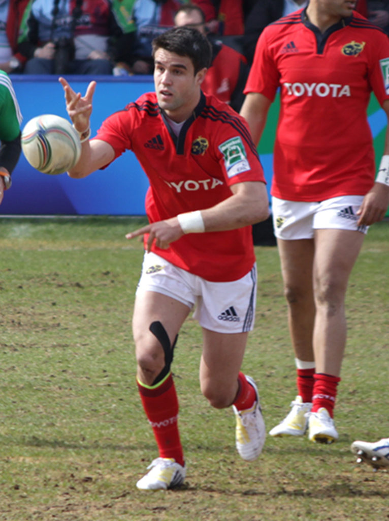 Conor Murray passes the ball away from the breakdown for Munster