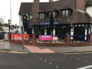 Outside the Birchgrove. The lack of railings has caused problems on the steep pavement.