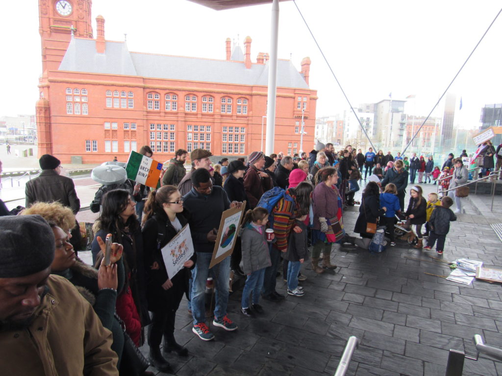 Hundreds of people formed a circle around the steps of the Senedd