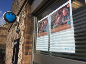 Image of posters at Barclays telling customers it is closing